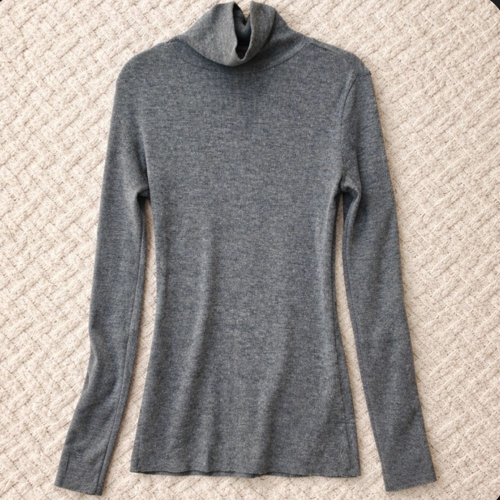 Caslon Charcoal Turtleneck Sweater with 5 buttons on the sleeves.